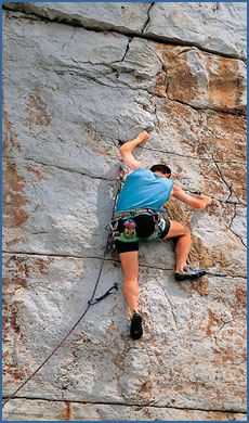 An unknown climber on Aquamarin (F6c) at Rovinj crag, in the Istria region of Croatia