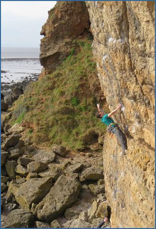 Ben Russell climbing Tide Rising (F7b+) at Brean Down