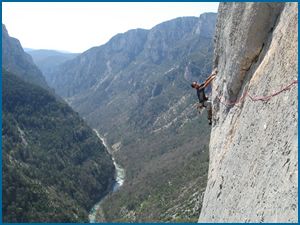 Unknown climber on an atmospheric big wall route in the Verdon Valley.