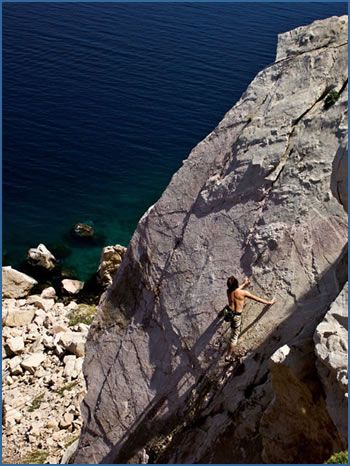 T. Simatis climbing Argonaftes (F6a) at Daskaleio crag near Athens