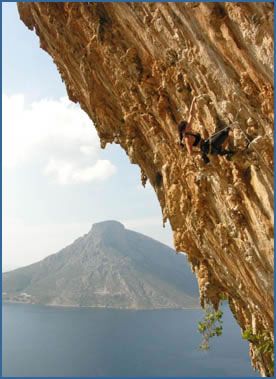 Eva climbing DNA, F8a+, at the famous Grande Grotta Sector at Kalymnos