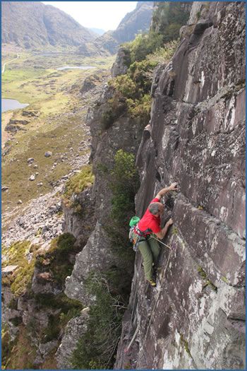 Damian O’Sullivan on Out of my Reach (HVS 5a) at Cap of Dunloe crag in County Kerry, Ireland