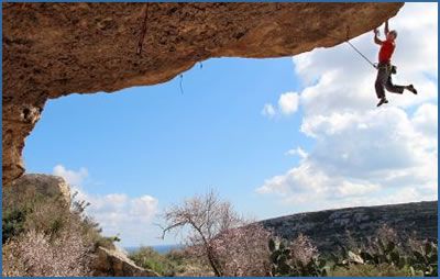 Stevie Haston on Little James* (F7c+) at Il-Mixta sector, Dahlet Qorrot crag in Gozo