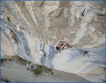 The photograph shows Cody Roth on a route in the Las Animas Wall sector of El Salto crag to the south of Monterrey