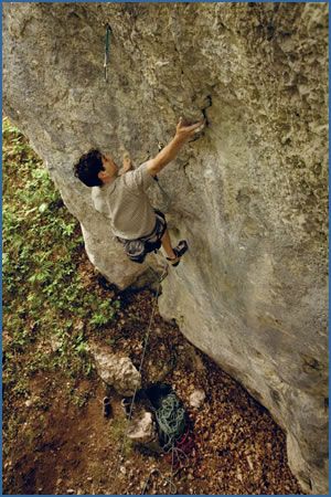 Claudiu Miu climbing La Messe, F8a+, at Tamina crag, Brasov