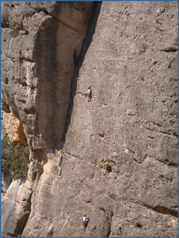 Unknown climbers on Anarcoma, F6b+, and Obsessio Continua, F6b at Estrets crag in the Els Ports Natural Park