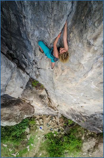 Ursula Salminen climbing “Argentinas Delight”, F6b at Butterfly Valley crag on Cat Ba Island